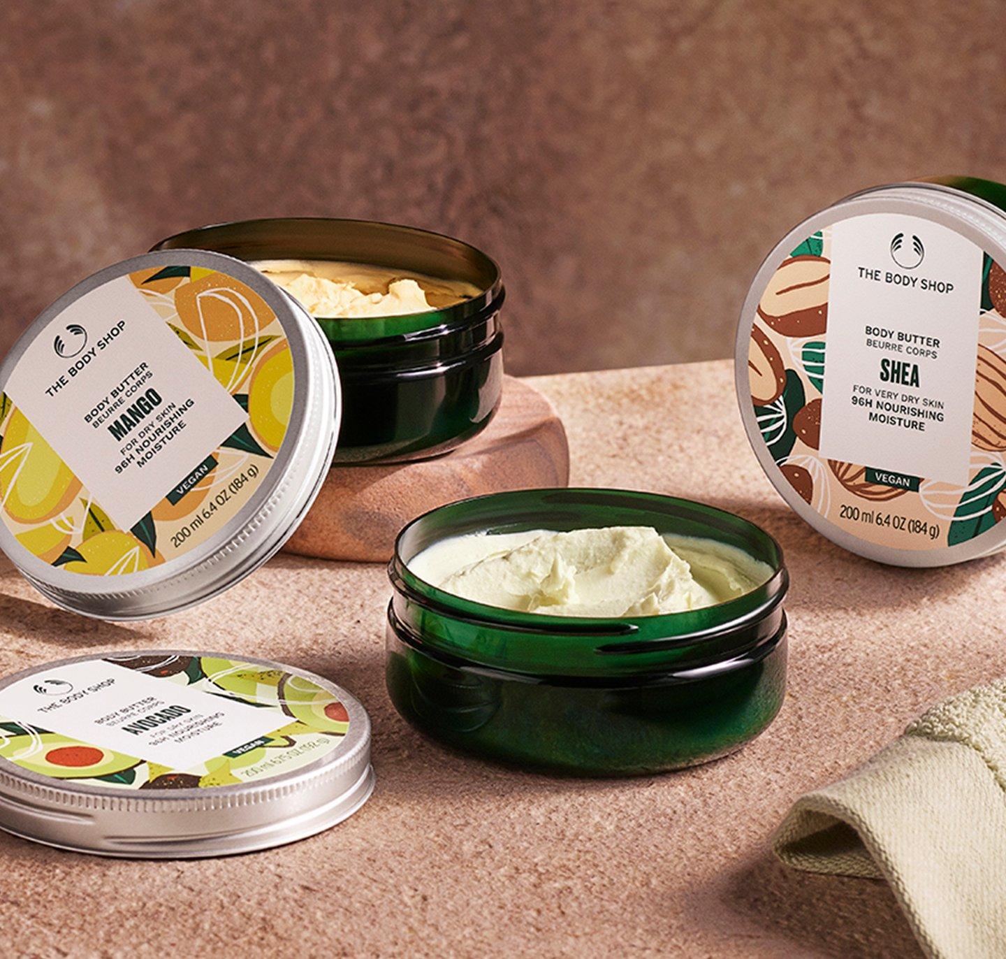 Selection of Body Butters with the lids off