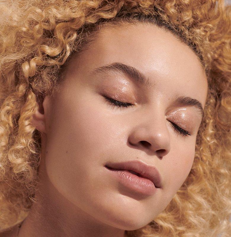 Woman looking well rested with eyes closed