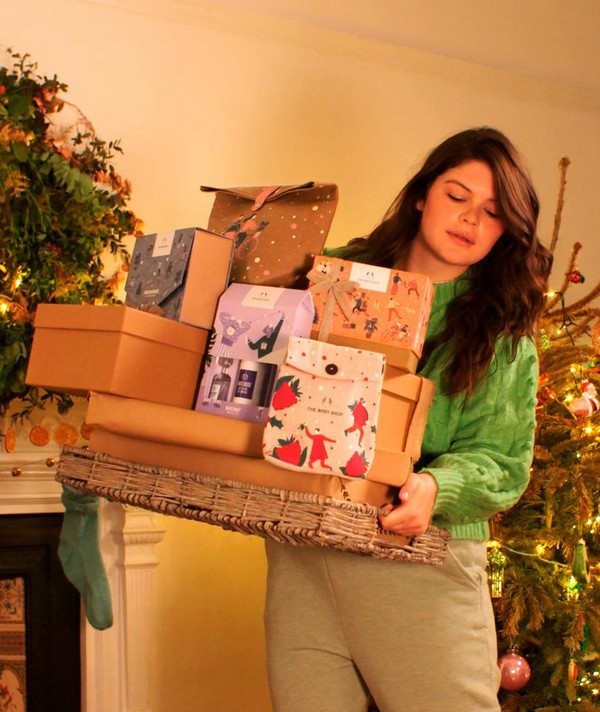 Girl carrying presents Girl carrying presents