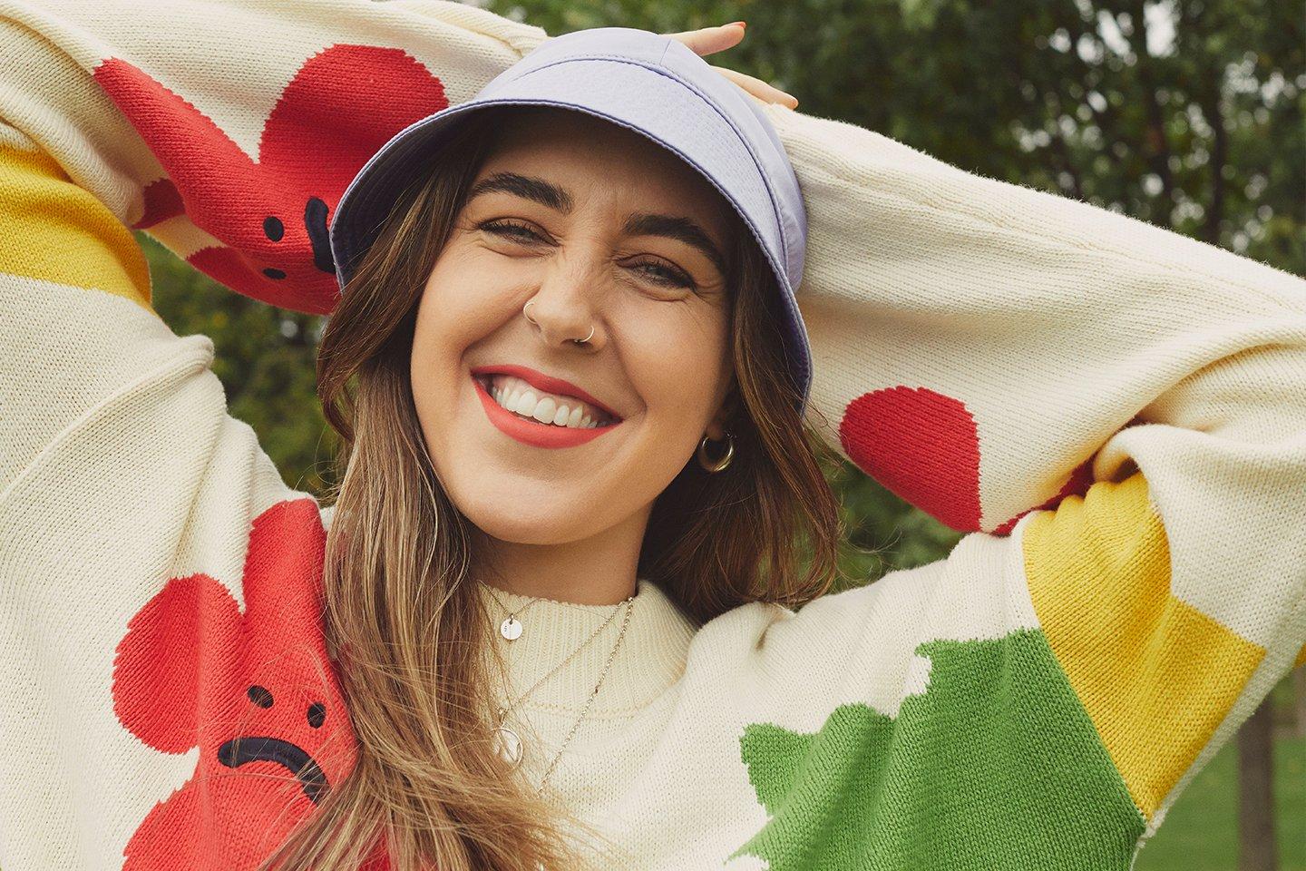 Gina Martin smiling at the camera