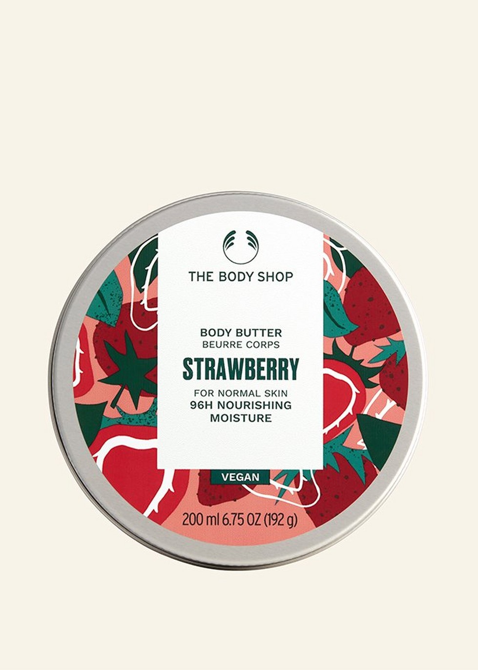 Strawberry body butter against beige background Strawberry body butter against beige background