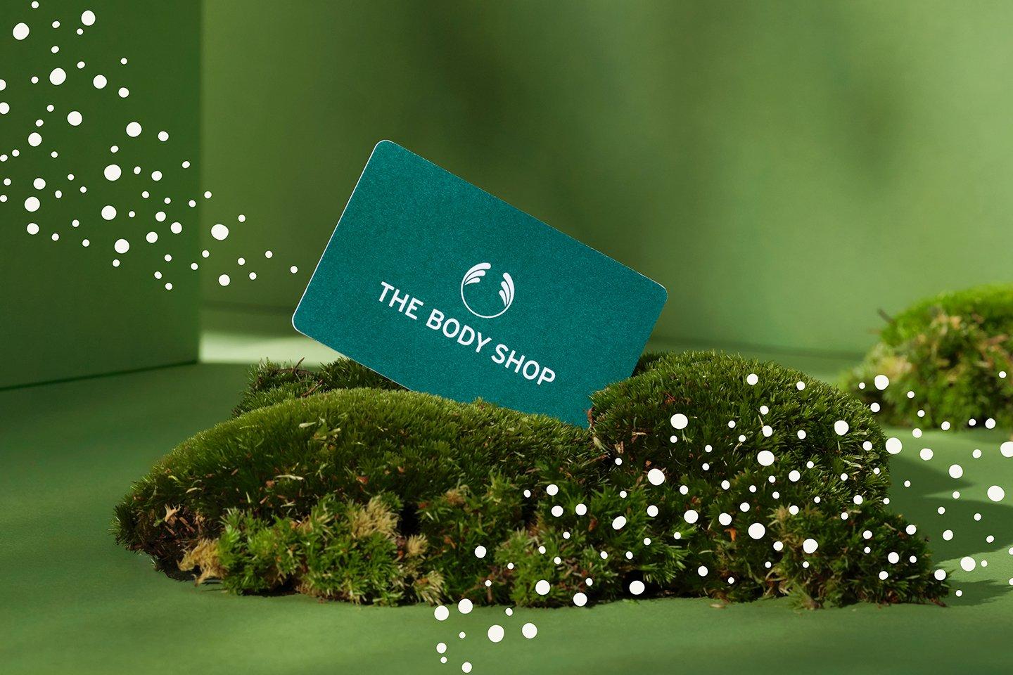 The Body Shop gift card in plant with white sparkles