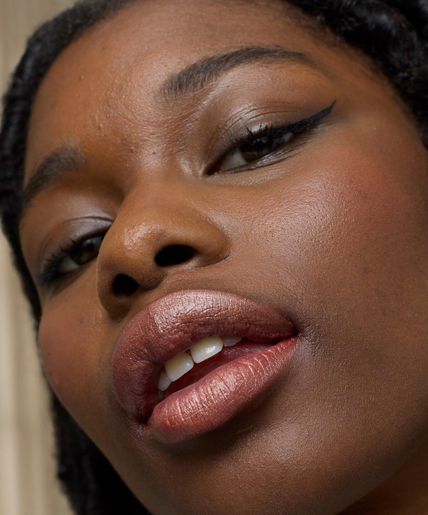 Model with sheer lipstick on