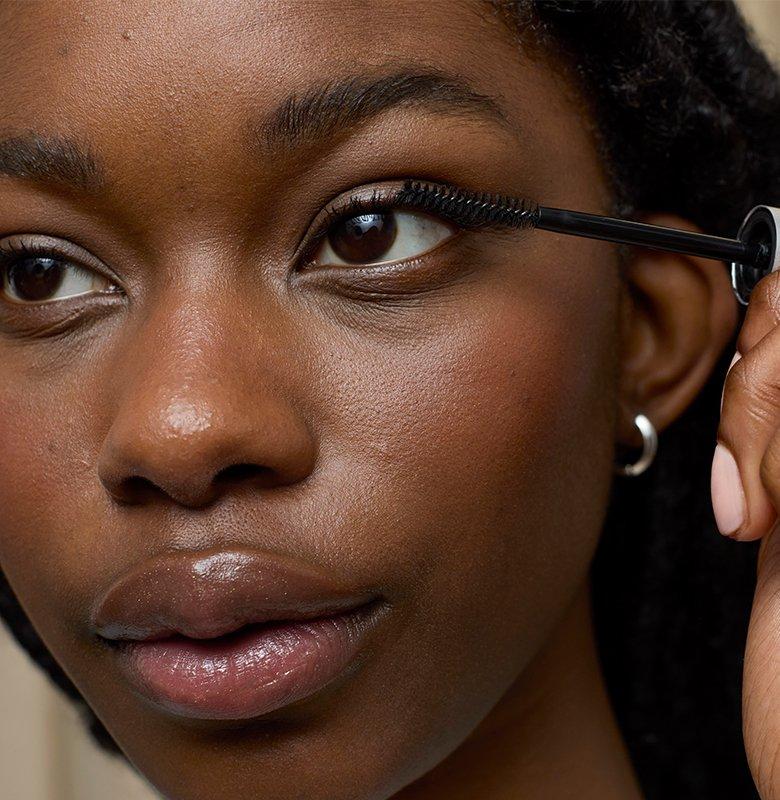 Female Model Applying Mascara