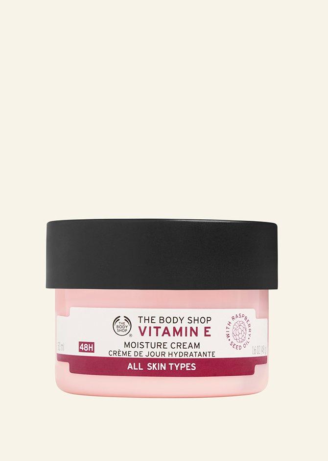 Vitamin E moisture cream against a cream background