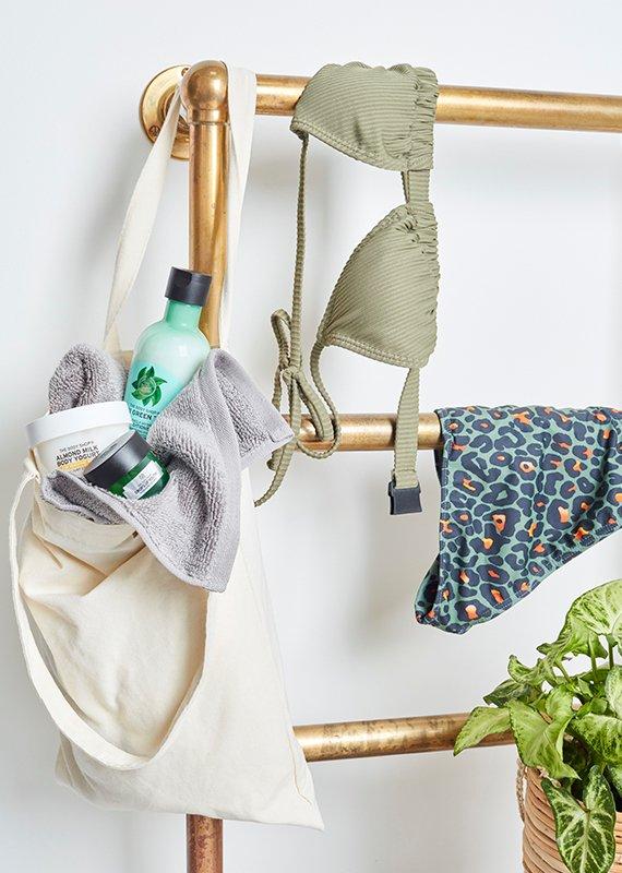 Gym clothes hung on a gold railing