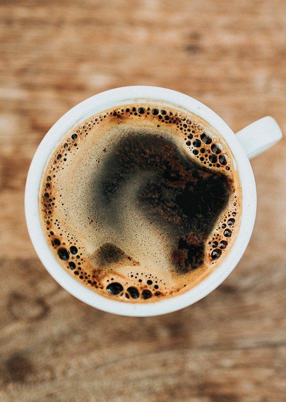 Coffee mug filled with coffee