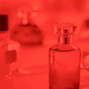 Selection of fragrance bottles with red filter overlay Selection of fragrance bottles with red filter overlay