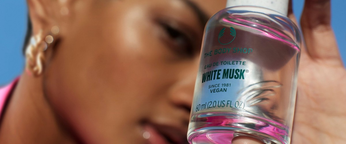 Woman holding The Body Shop White Musk Eau De Parfum