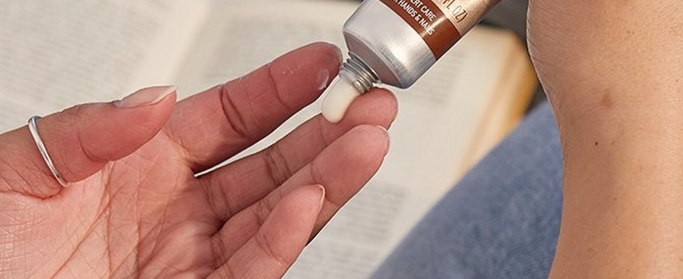 Model applying Almond Hand Cream Model applying Almond Hand Cream