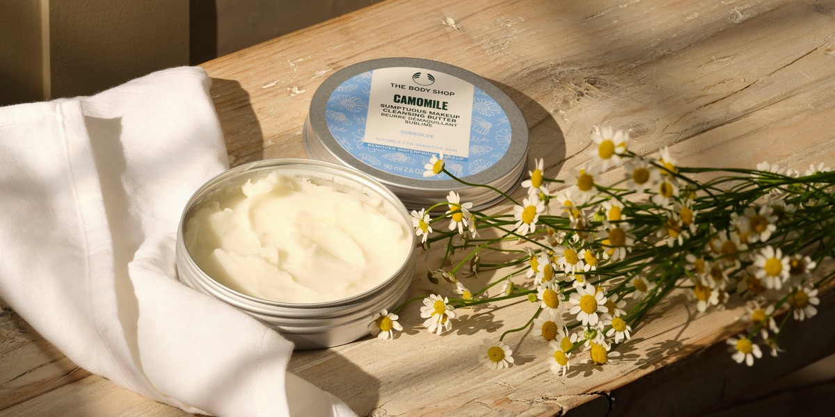 a jar of Camomile cleansing butter on a wooden table