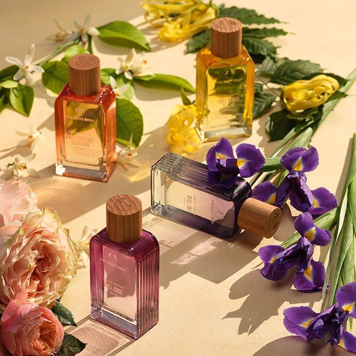 fragrance bottles with flowers