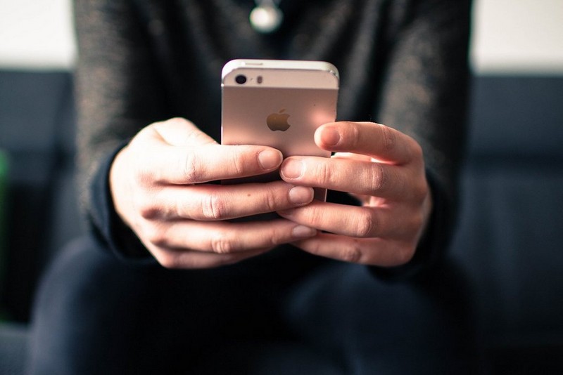 User holding iphone User holding iphone