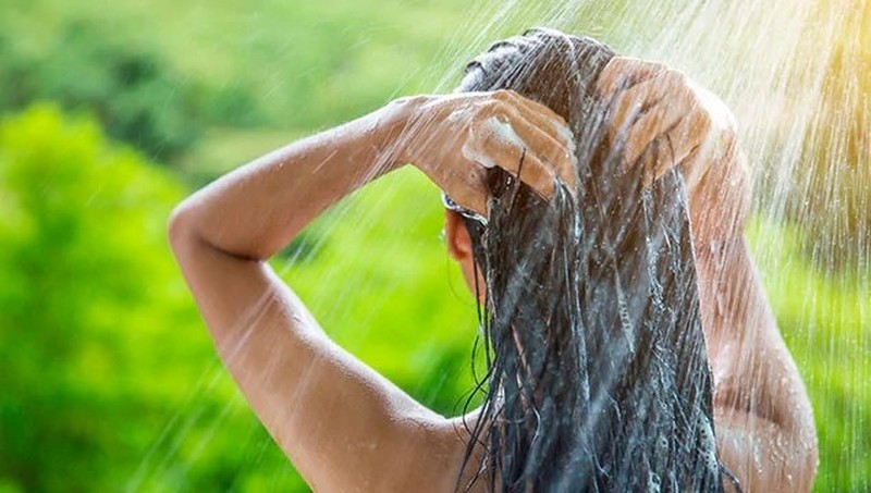 Woman washing her hair Woman washing her hair