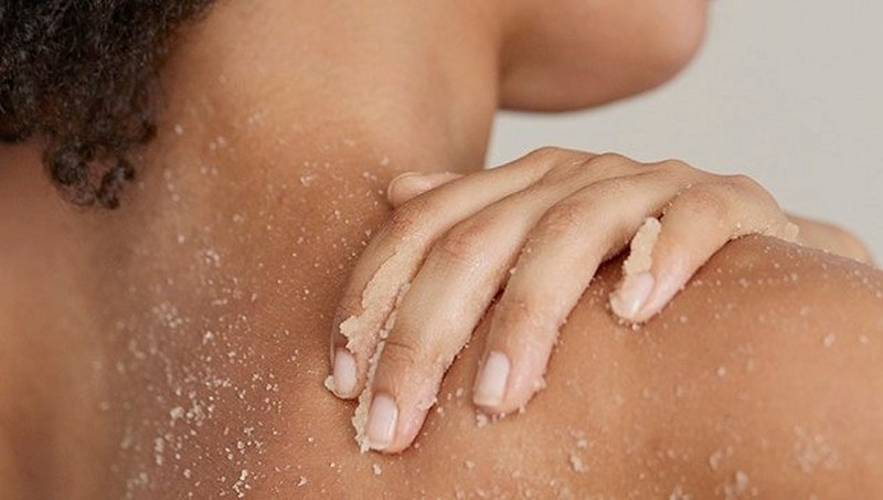 Applying exfoliator Applying exfoliator