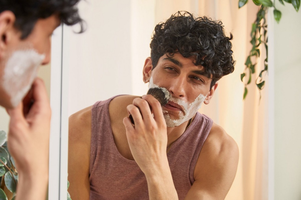 Man applying shaving cream
