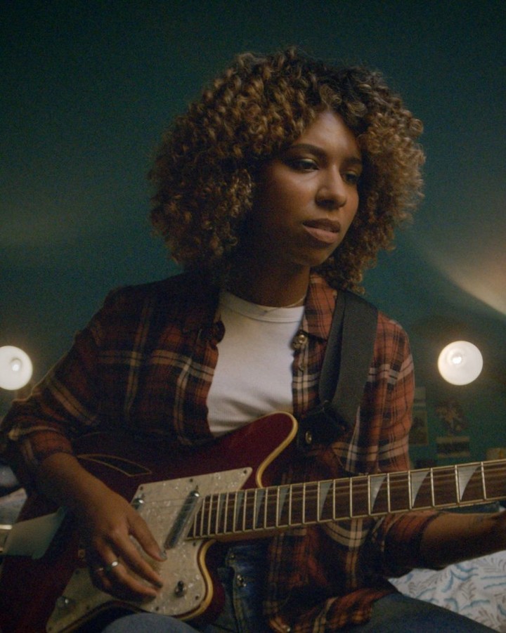 Woman playing guitar Woman playing guitar