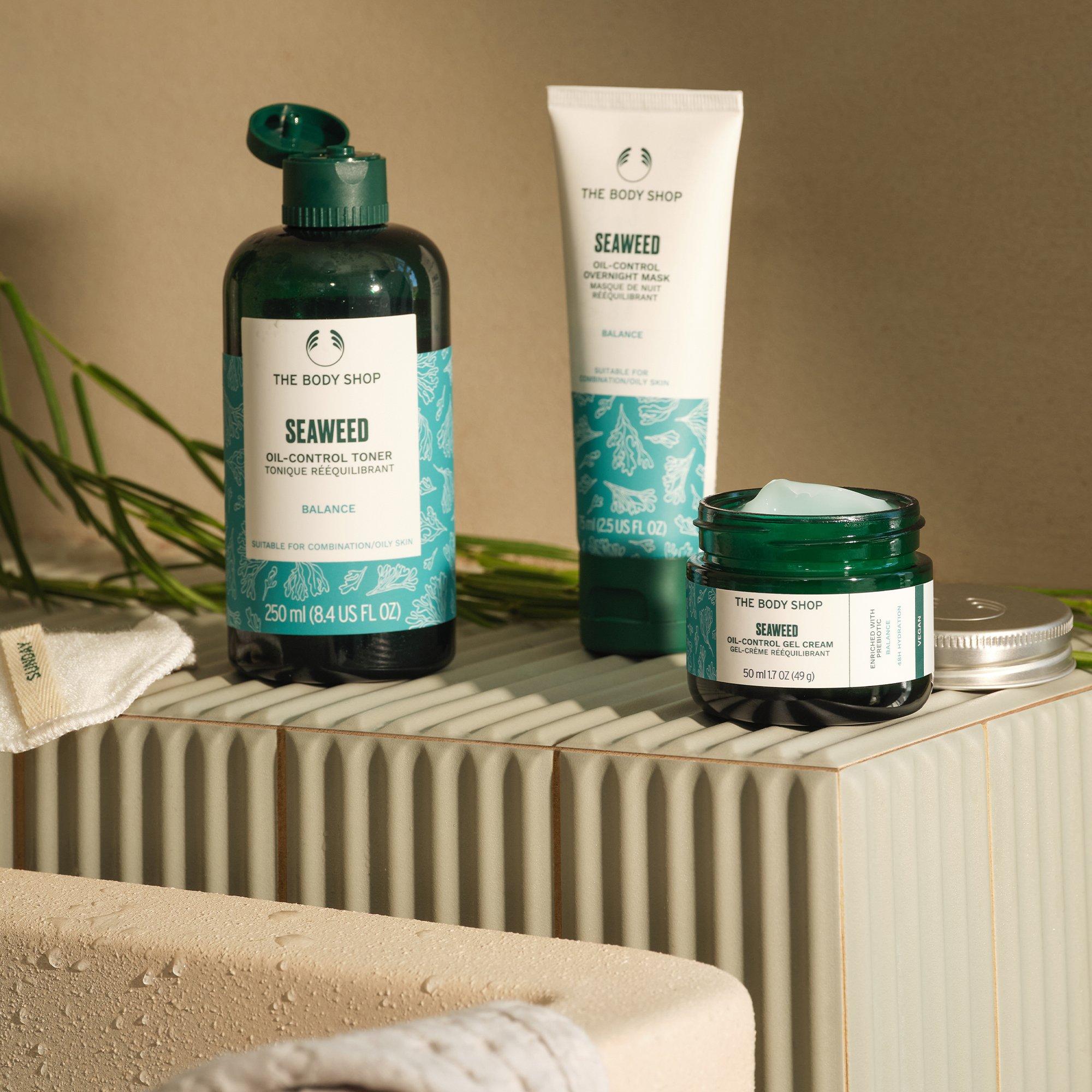 Hands scooping The Body Shop Seaweed Gel Cream