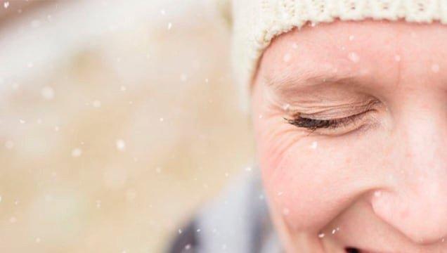 Woman's face in the snowy weather
